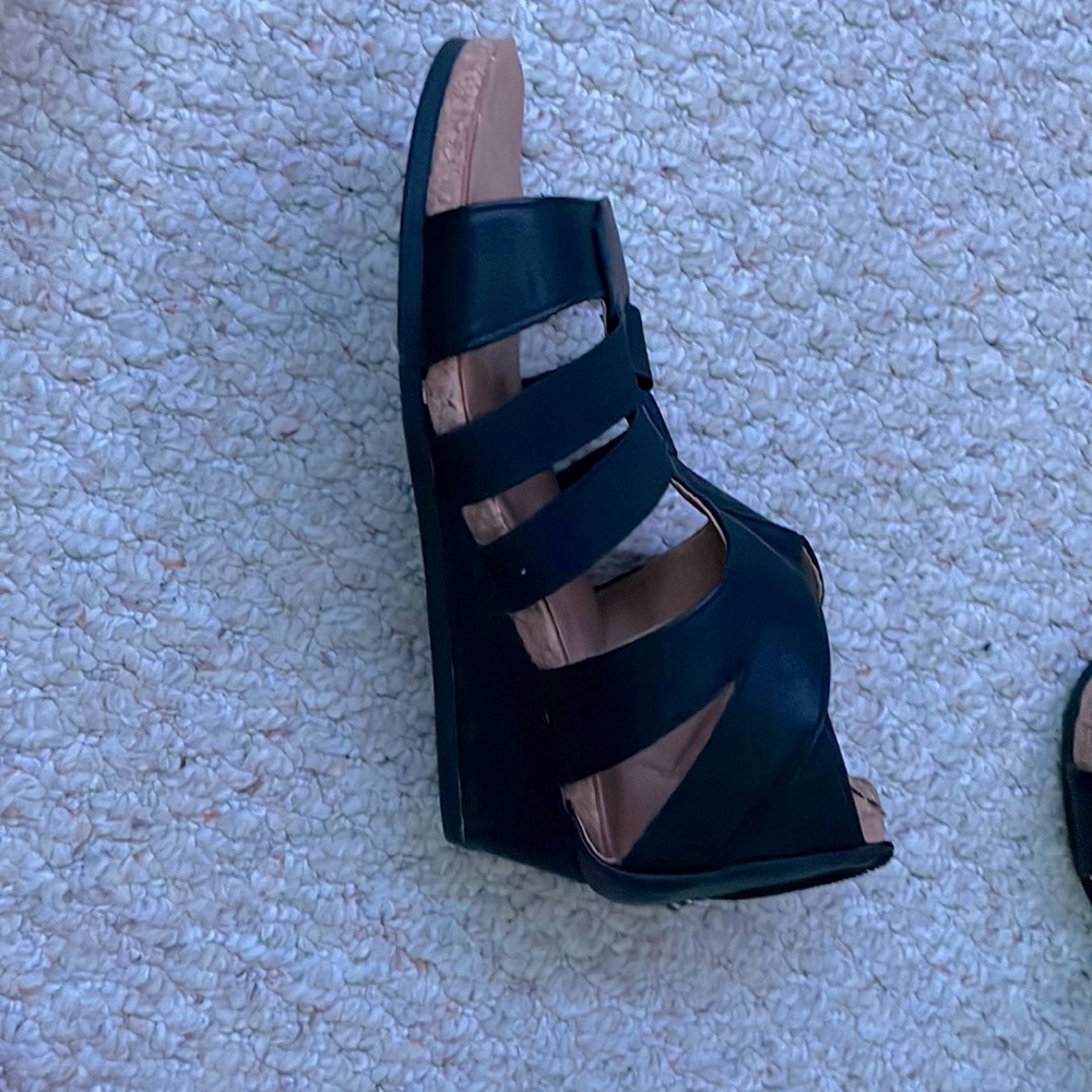Size 7.5 women’s Black wedge Sandals